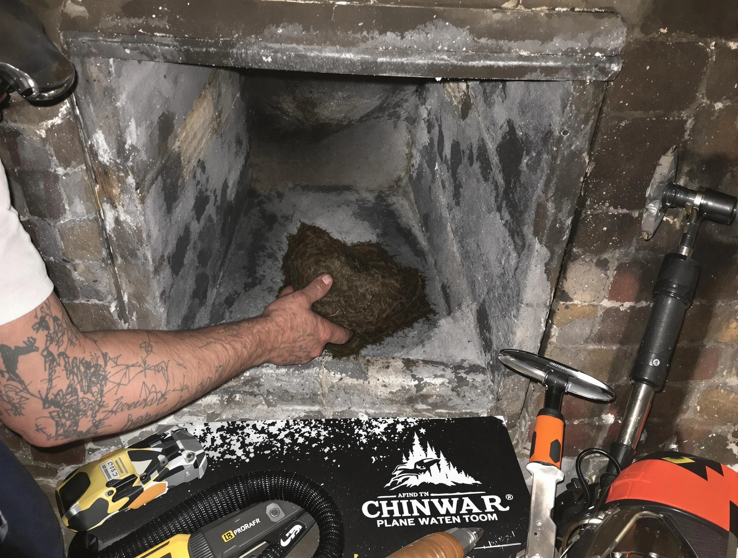 Ramapo Chimney Sweep safely removing debris and screening chimney in Ramapo, NY