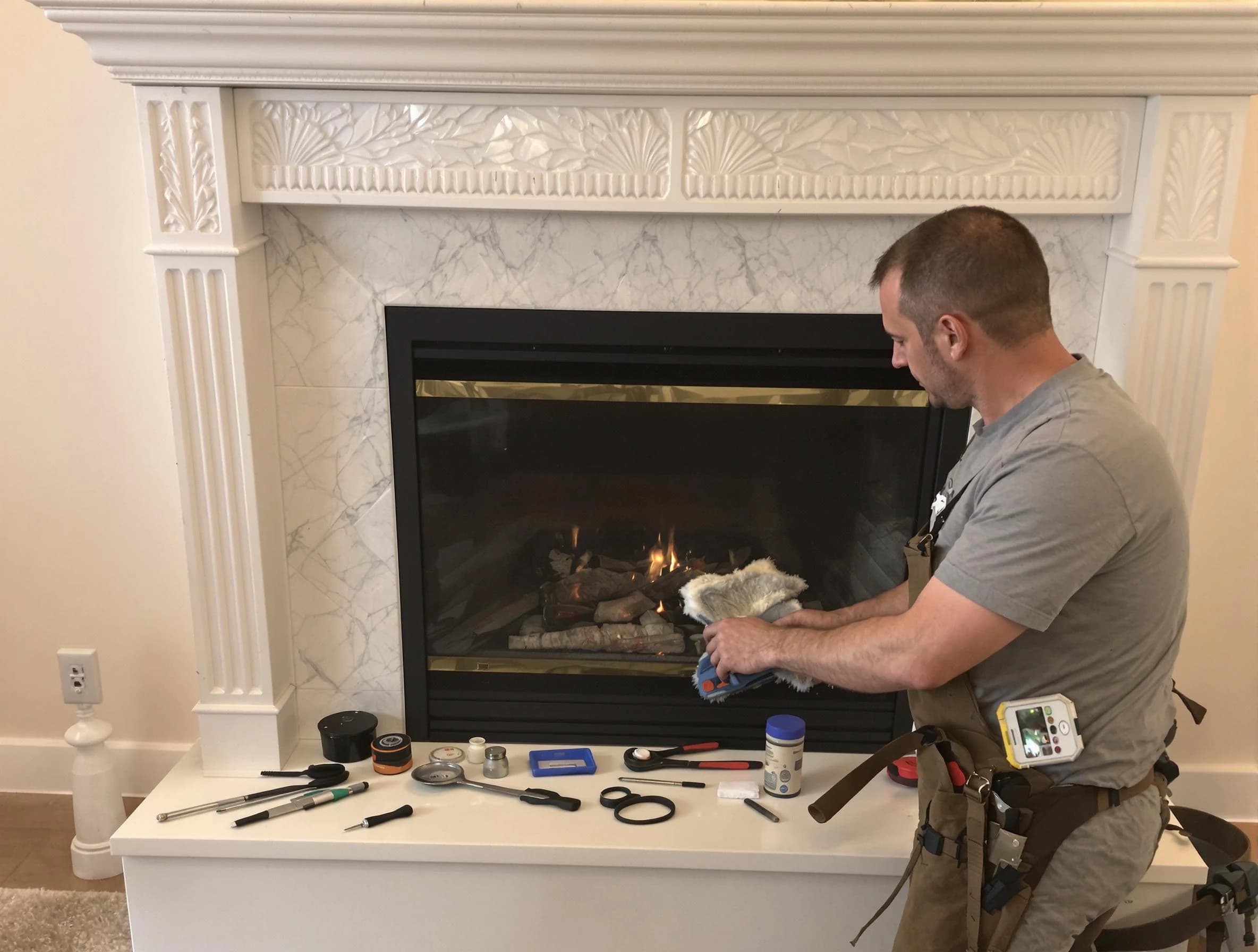 Ramapo Chimney Sweep performing fireplace maintenance in Ramapo, NY